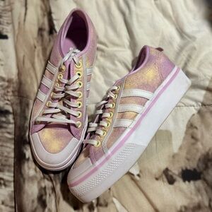 Women’s size 9.5 Adidas lace up sneaker pink/purple colored